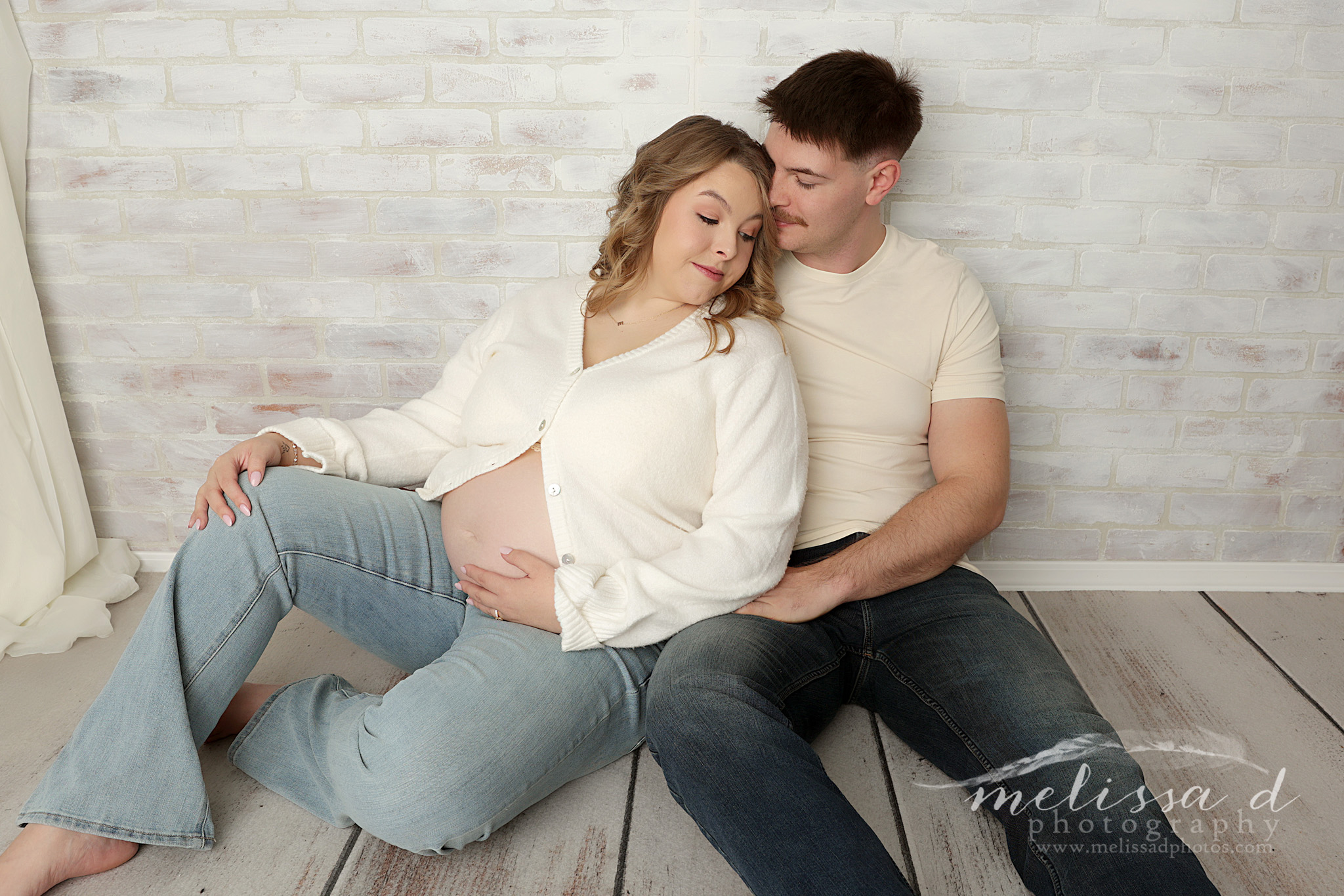 Keller Maternity Pictures cozy sitting pose