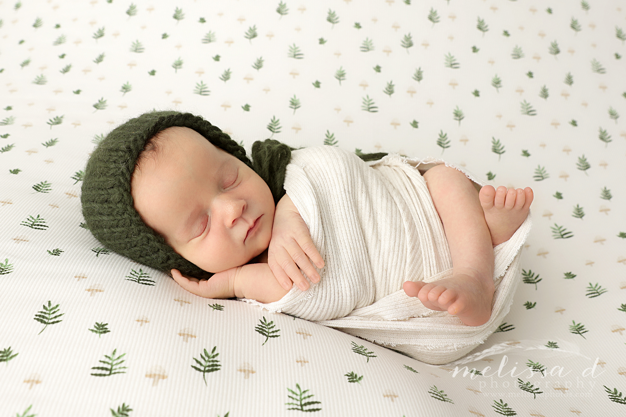 Fort Worth Newborn Twin Photographer wrapped green bonnet