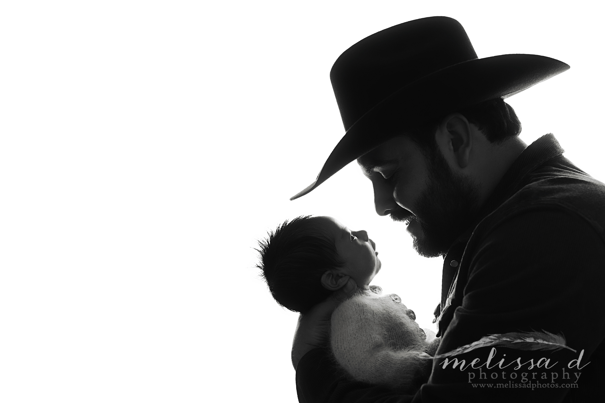 Colleyville Newborn Photographer silhouette father and son