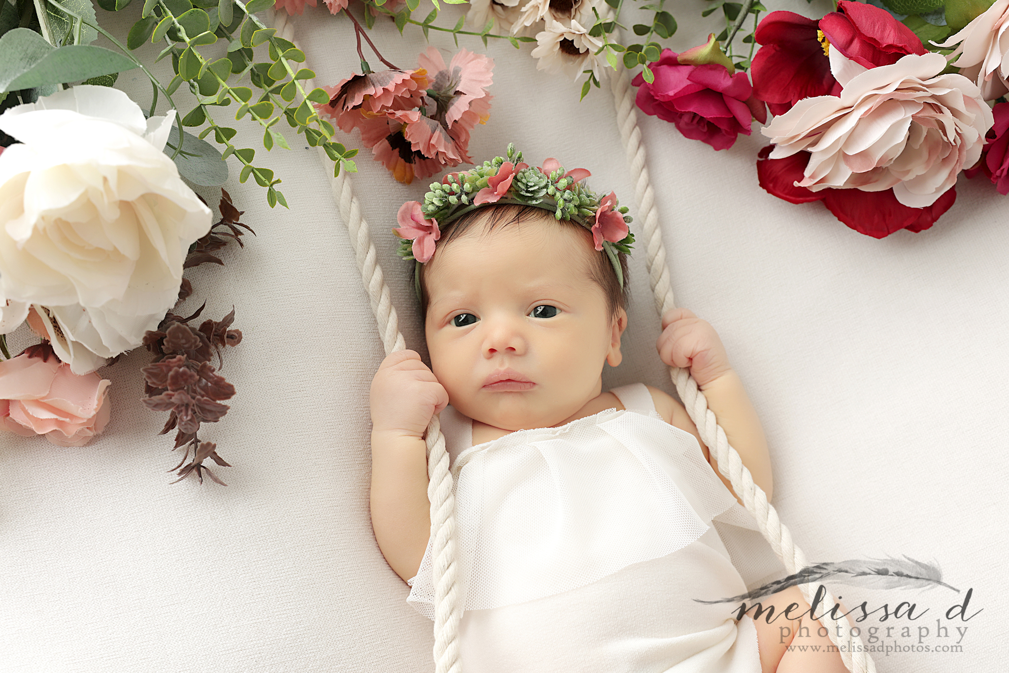 Colleyville Newborn Photographer swing prop flowers